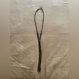 Long brown beaded necklace